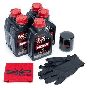 EVP Motul R Oil Change Kit components laid out, including Motul 8100 5W-50 bottles, oil filter, and gloves. 