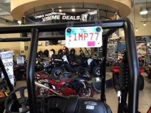 Black rubber license plate strap bracket for SxS vehicles 